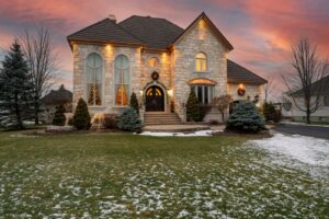 Residential home exterior illustrating home security protection and monitoring